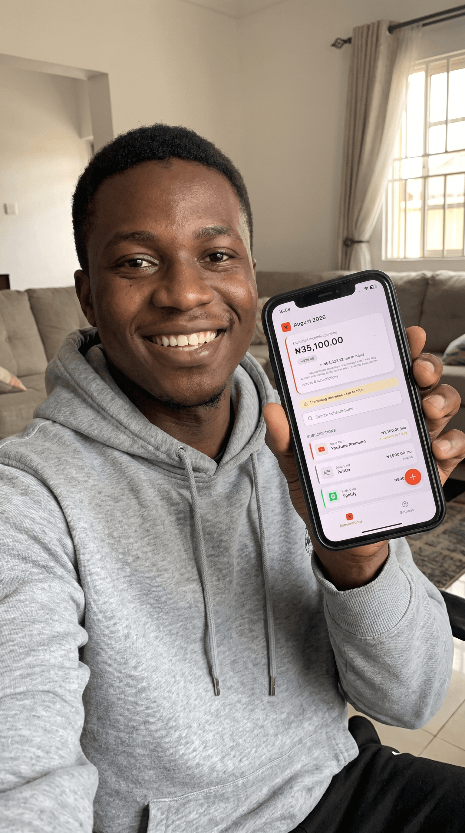Person showing Harbingr on iPhone