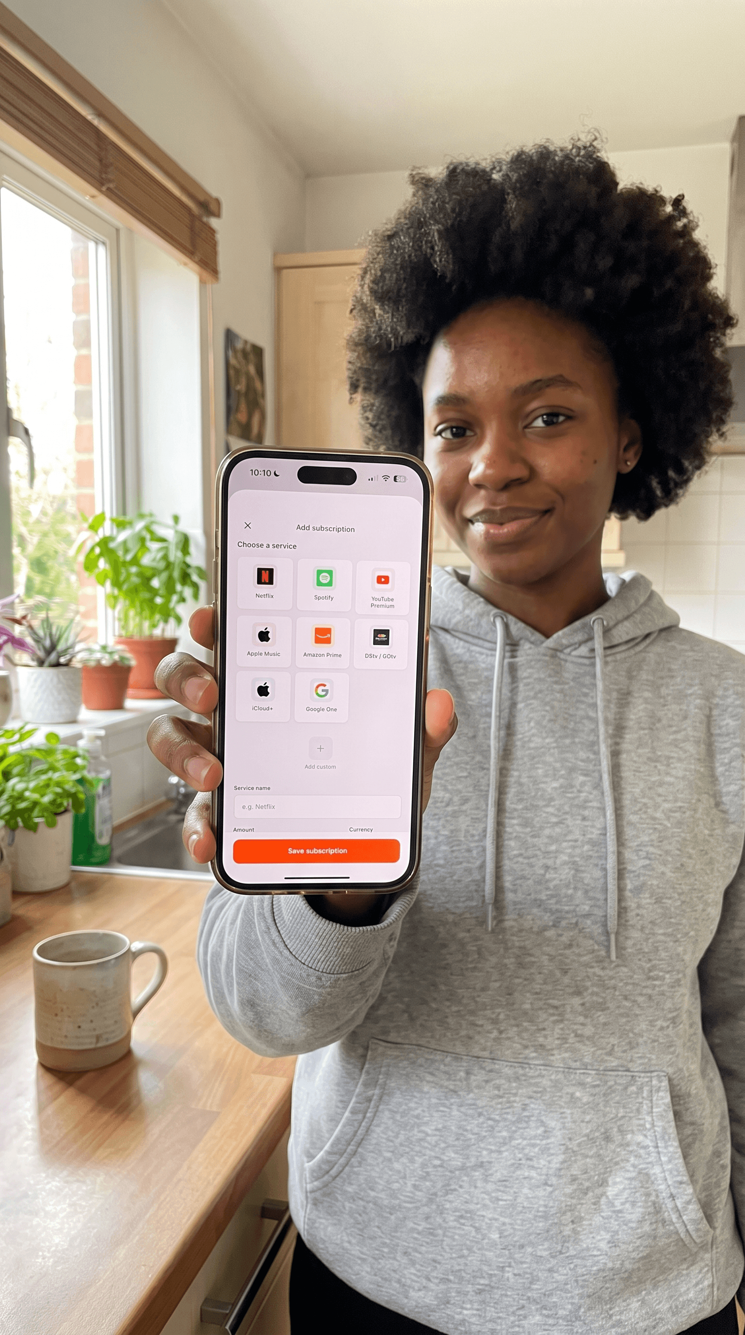 Person showing Harbingr add-subscription screen